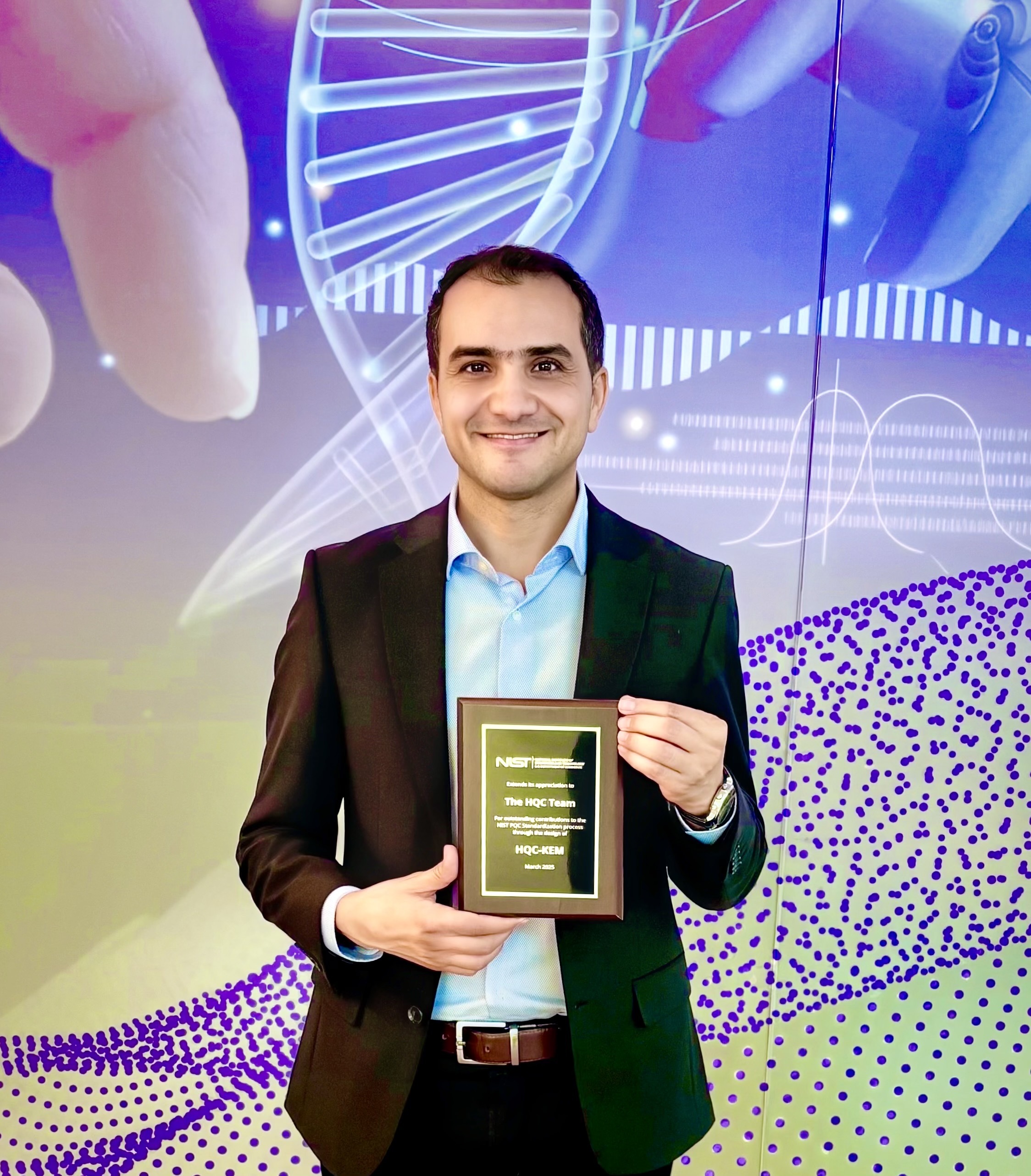Slim Bettaieb with the NIST plaque recognising HQC selection for post-quantum standardisation